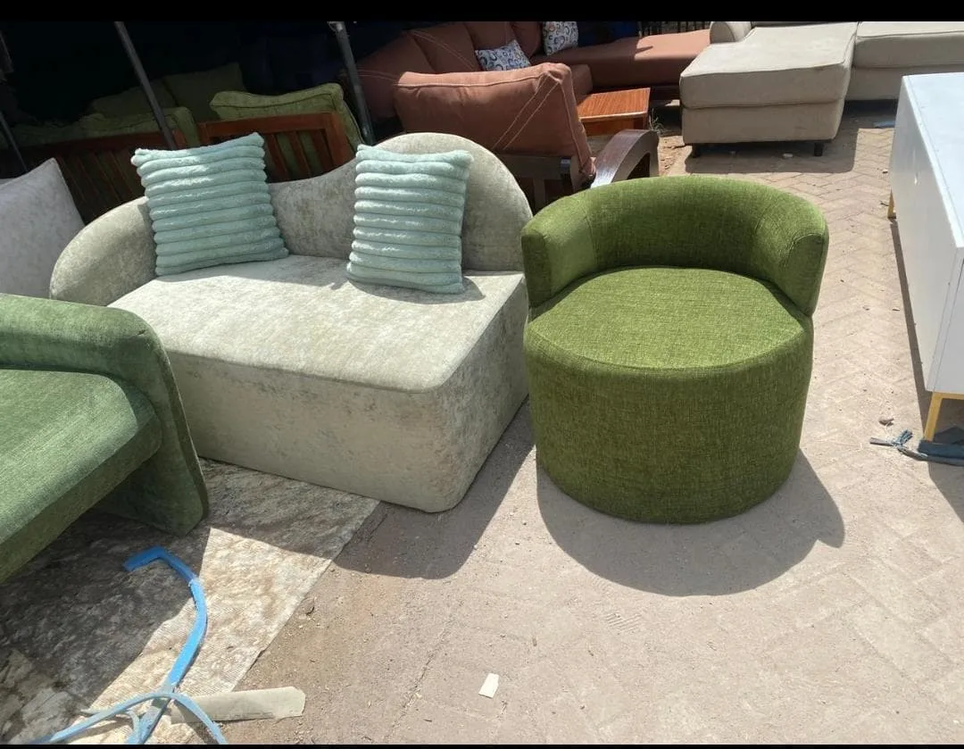 Rounded two-seater sofa